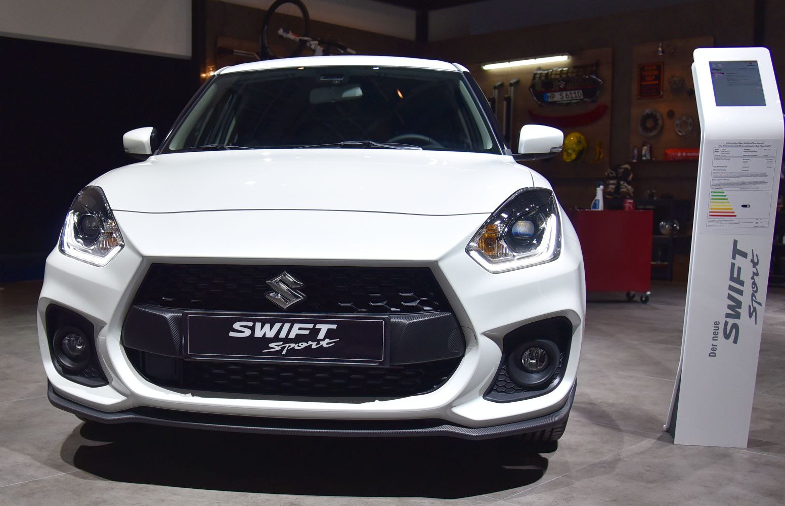 Aggressive front view with distinctive headlights and sporty grille