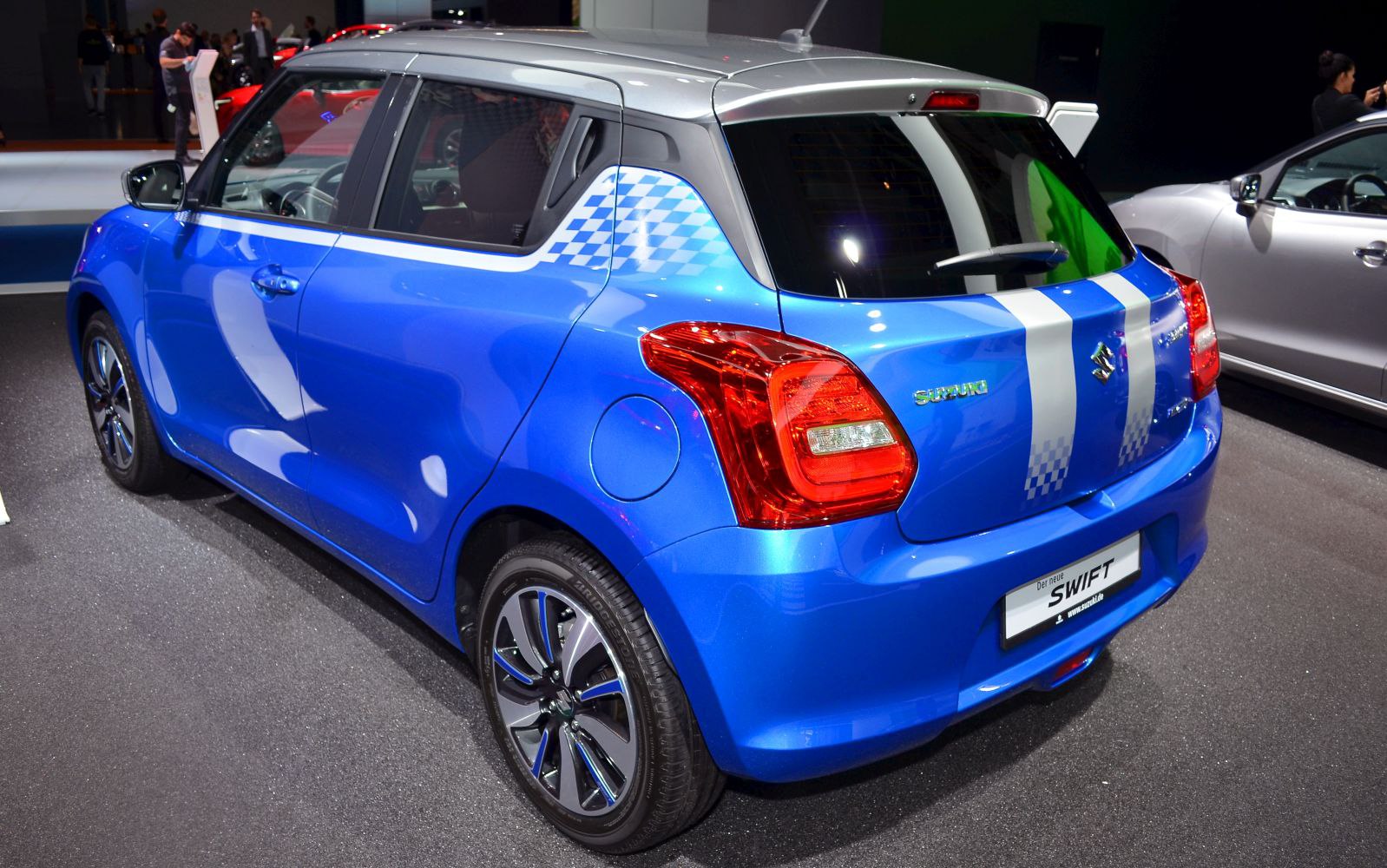 Rear and side view with sporty checker decals and distinct taillights