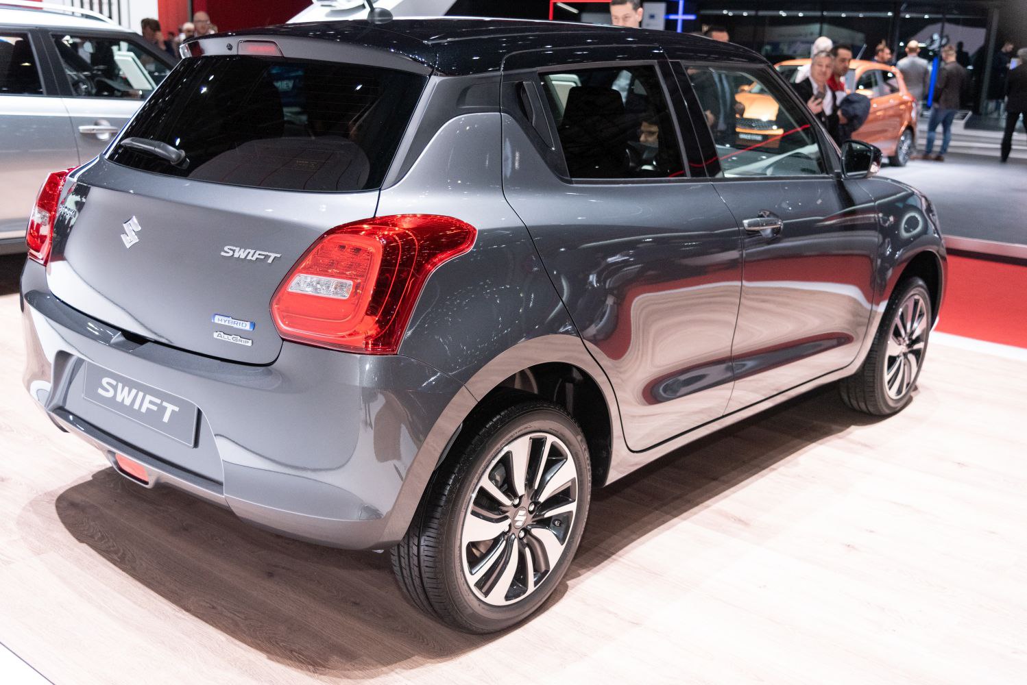 Rear side view, hybrid and all-wheel-drive badges, modern taillights, alloy wheels