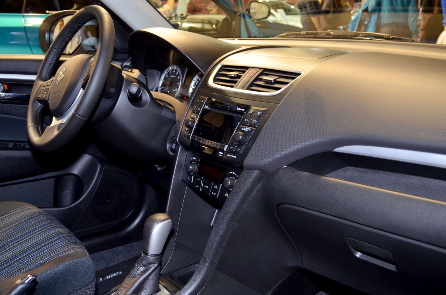Dashboard and steering wheel with infotainment and climate controls