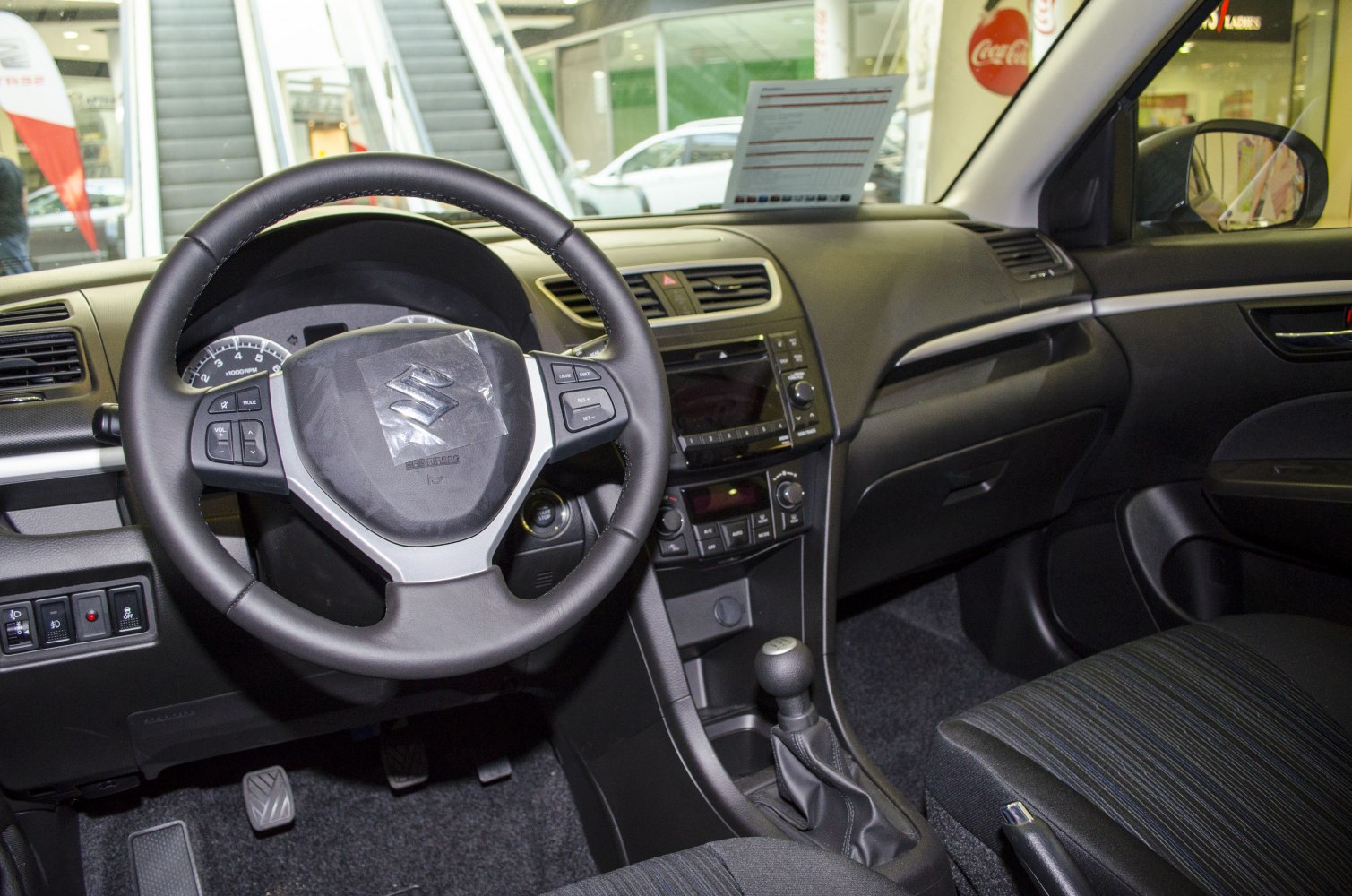 Manual transmission and multifunction steering wheel interior