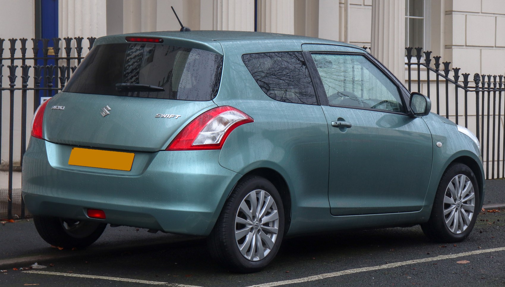 Rear and side view of a compact hatchback with distinctive rear taillights
