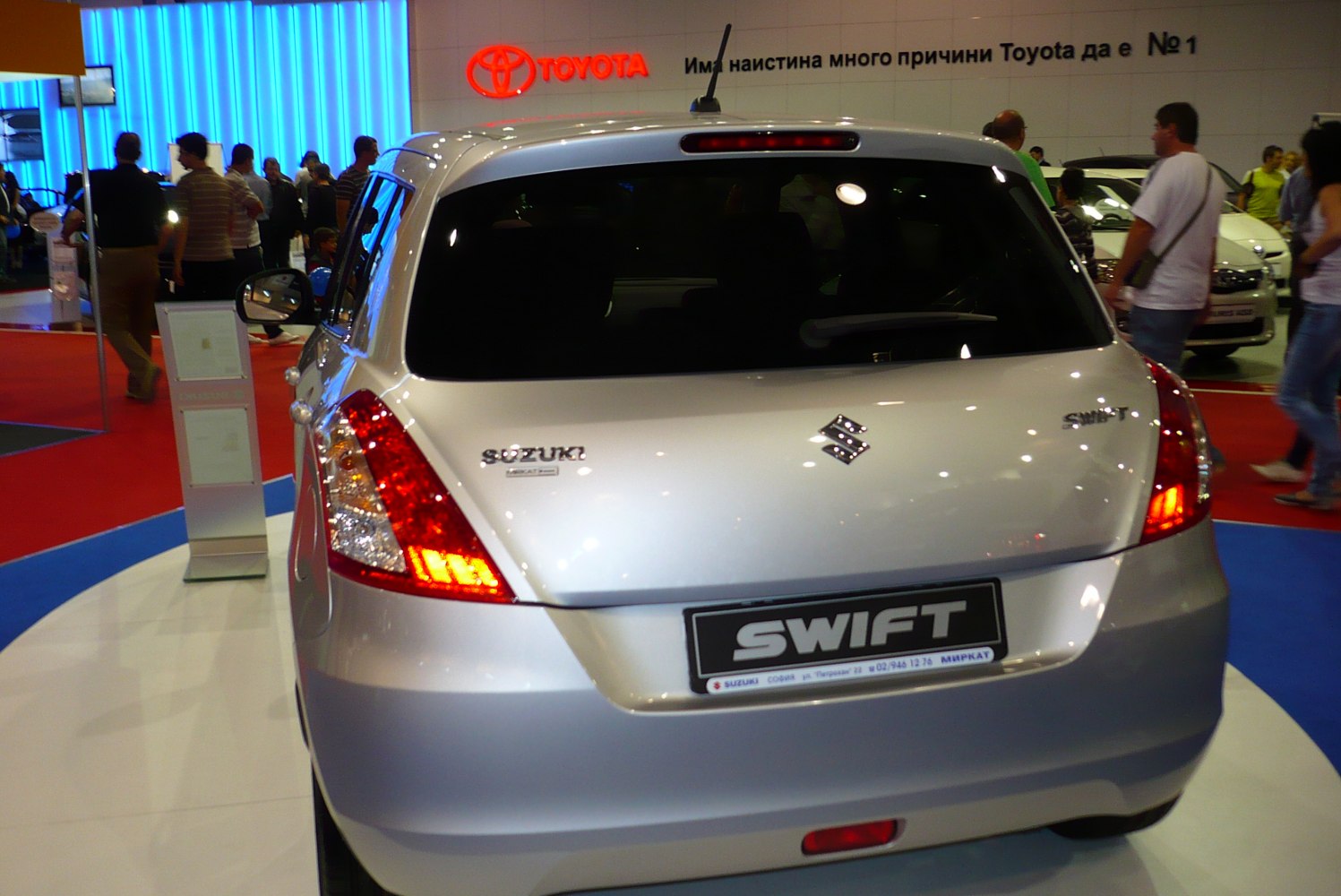 Rear hatch with illuminated taillights and rear window wiper