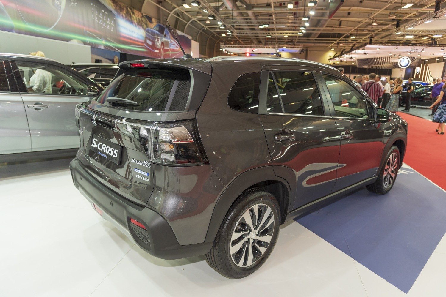 Rear and side view of a modern hybrid SUV with distinctive lights and alloy wheels