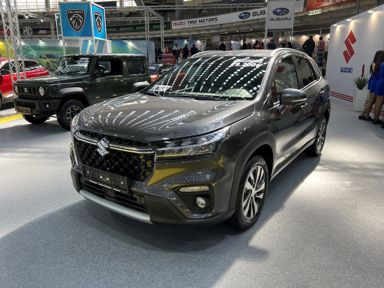Modern SUV front view with prominent grille and LED headlights