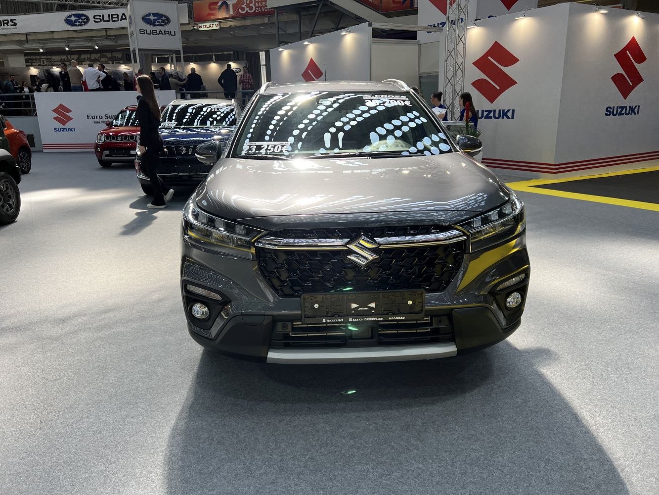 Front view with LED headlights and prominent grille