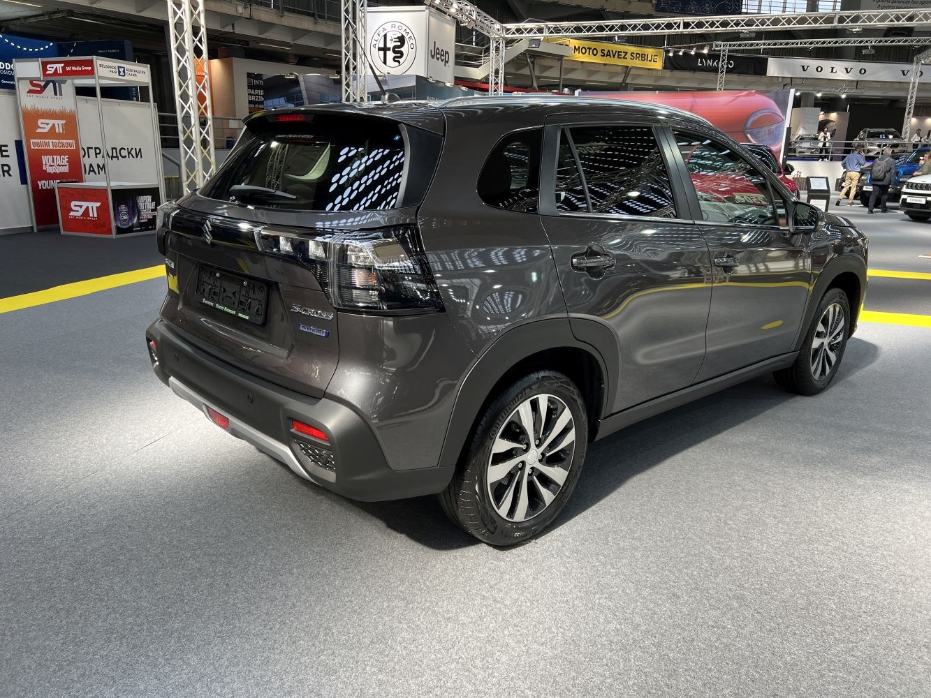 Rear and side view of a modern SUV with distinct rear lights and alloy wheels