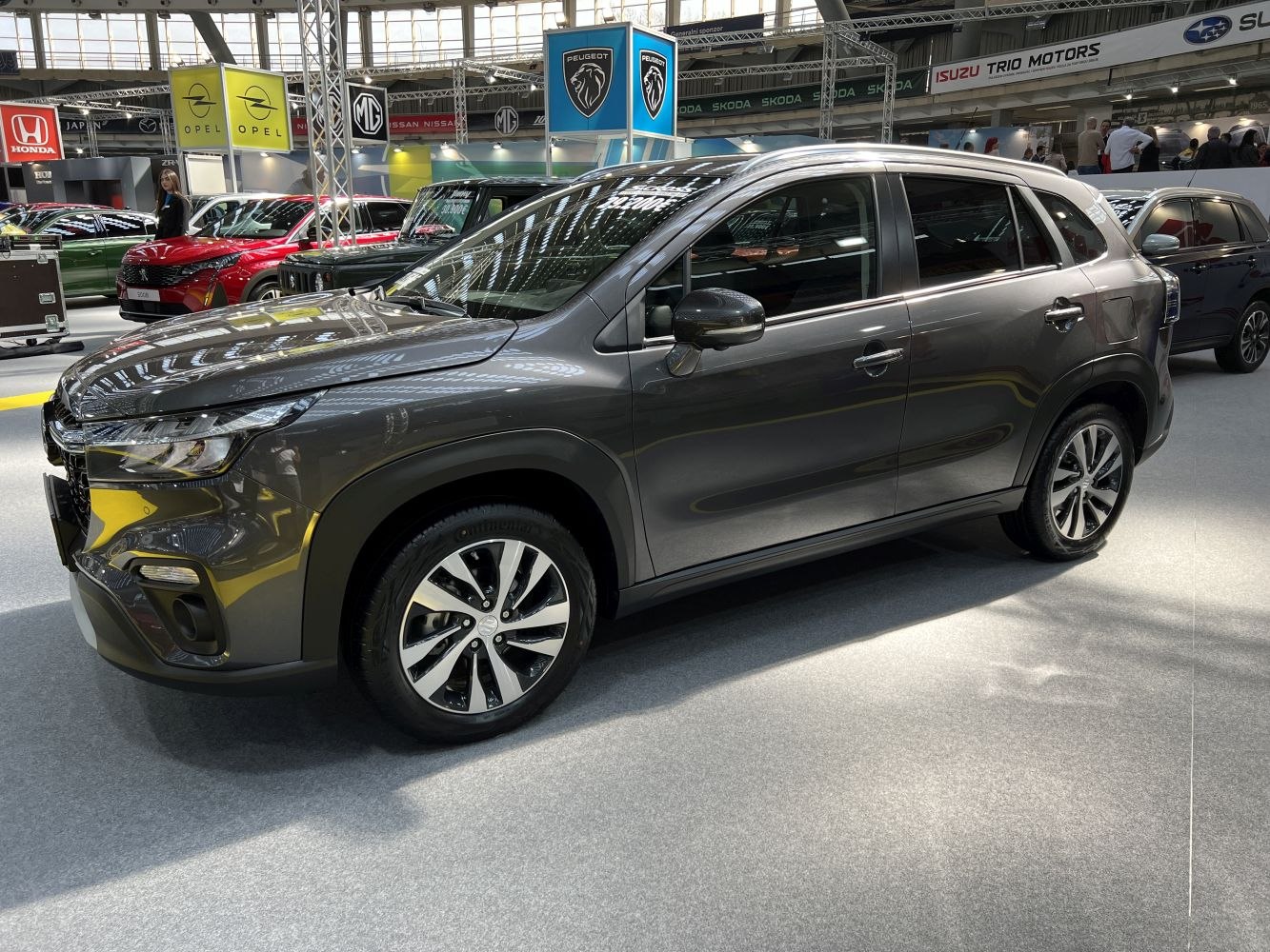 Front side view of a modern compact crossover with alloy wheels