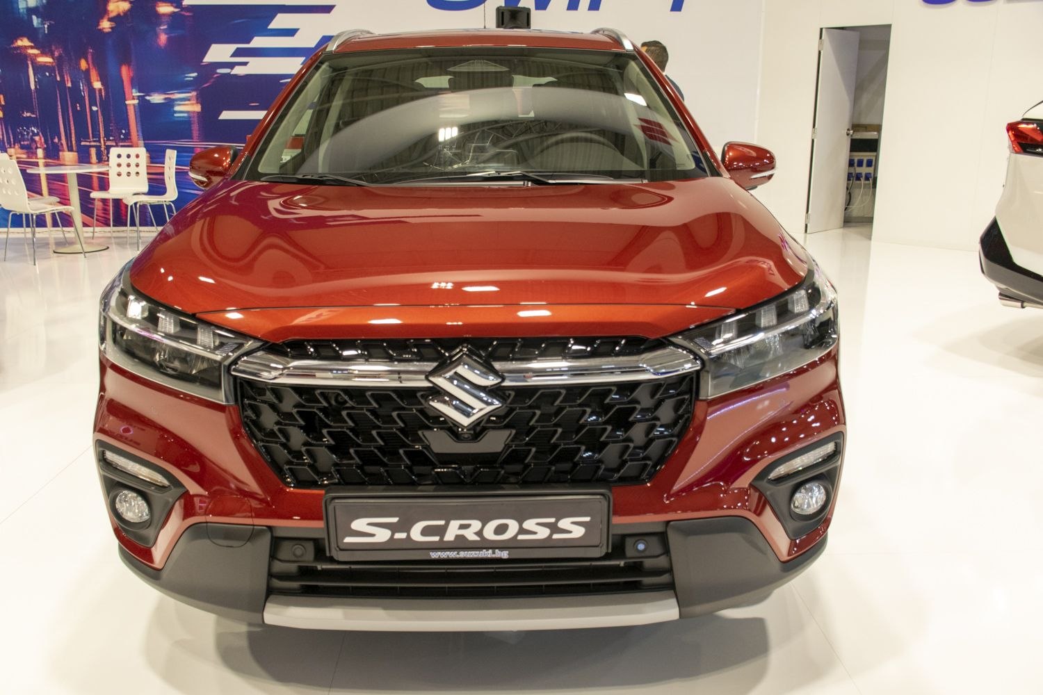Front close-up of SUV with distinctive grille and headlights