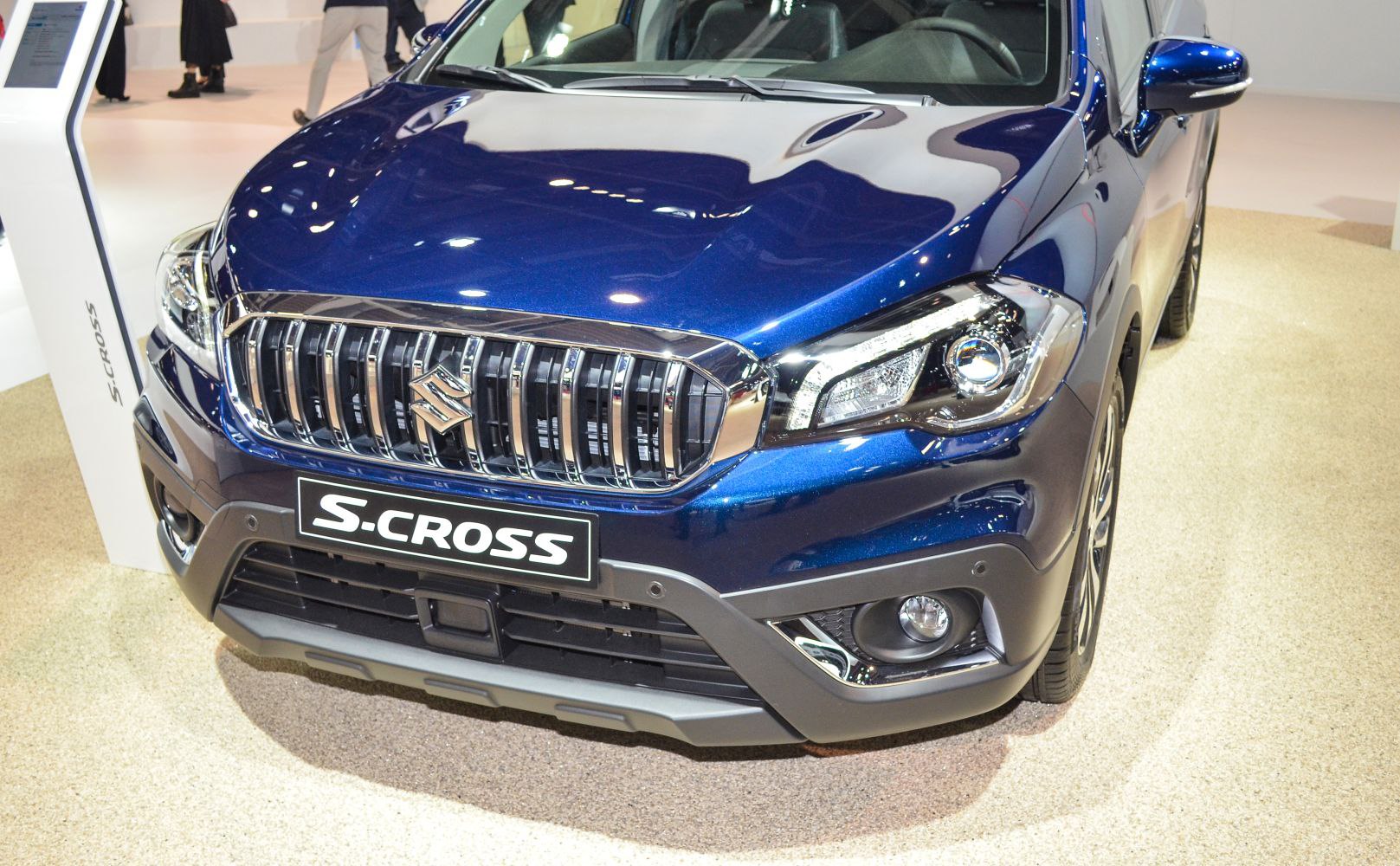 Front grille and headlights of modern crossover SUV