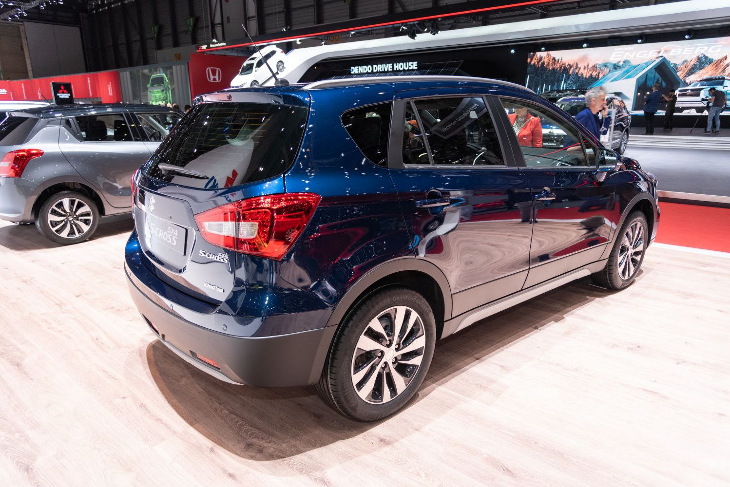 Rear and side profile of a compact crossover SUV with sleek taillights and multi-spoke alloy wheels