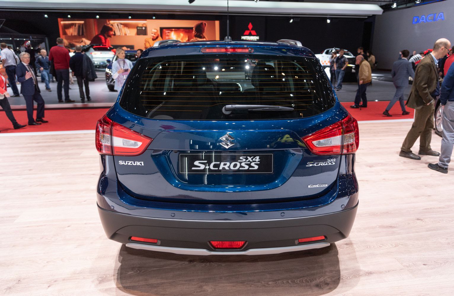 Rear view with distinctive tail lights and rear windshield wiper