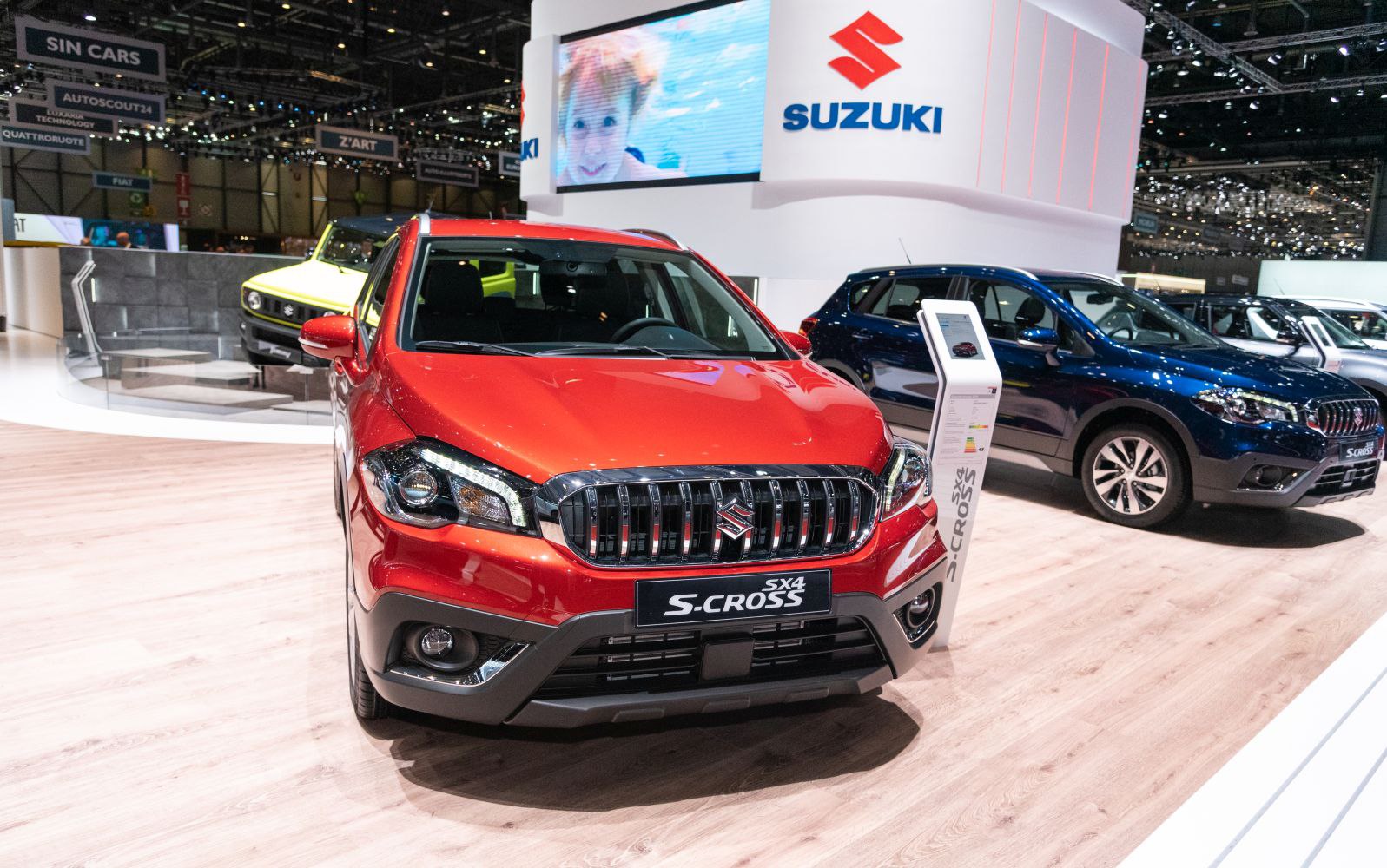 Front grille and headlights of a Suzuki crossover SUV.