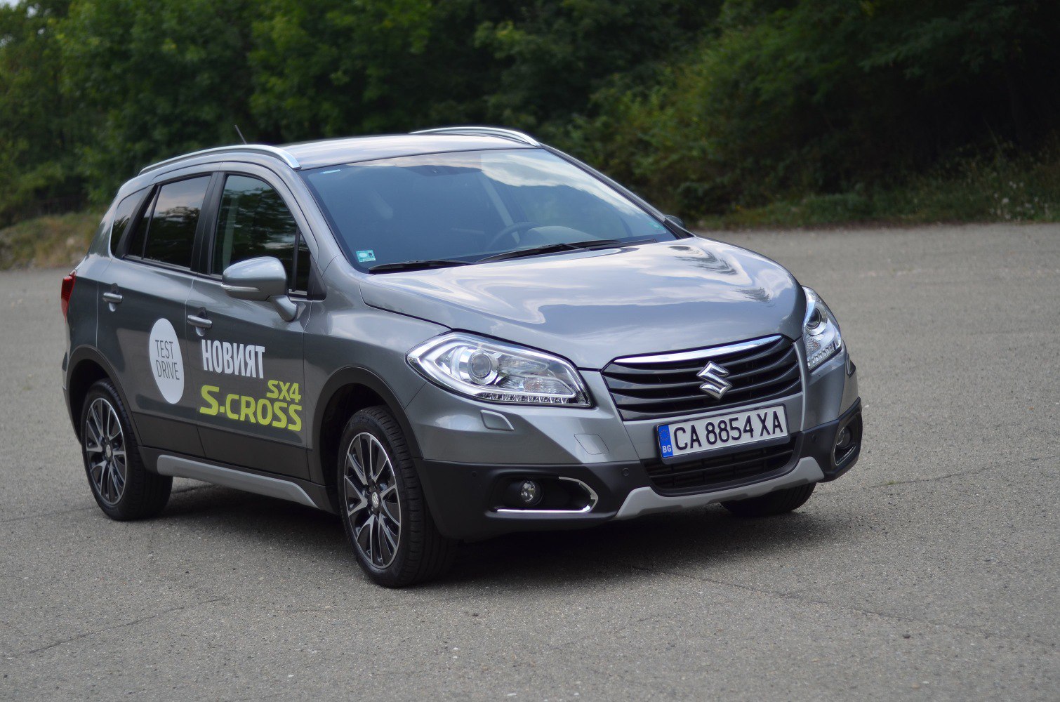 Front and side view with LED headlights and alloy wheels
