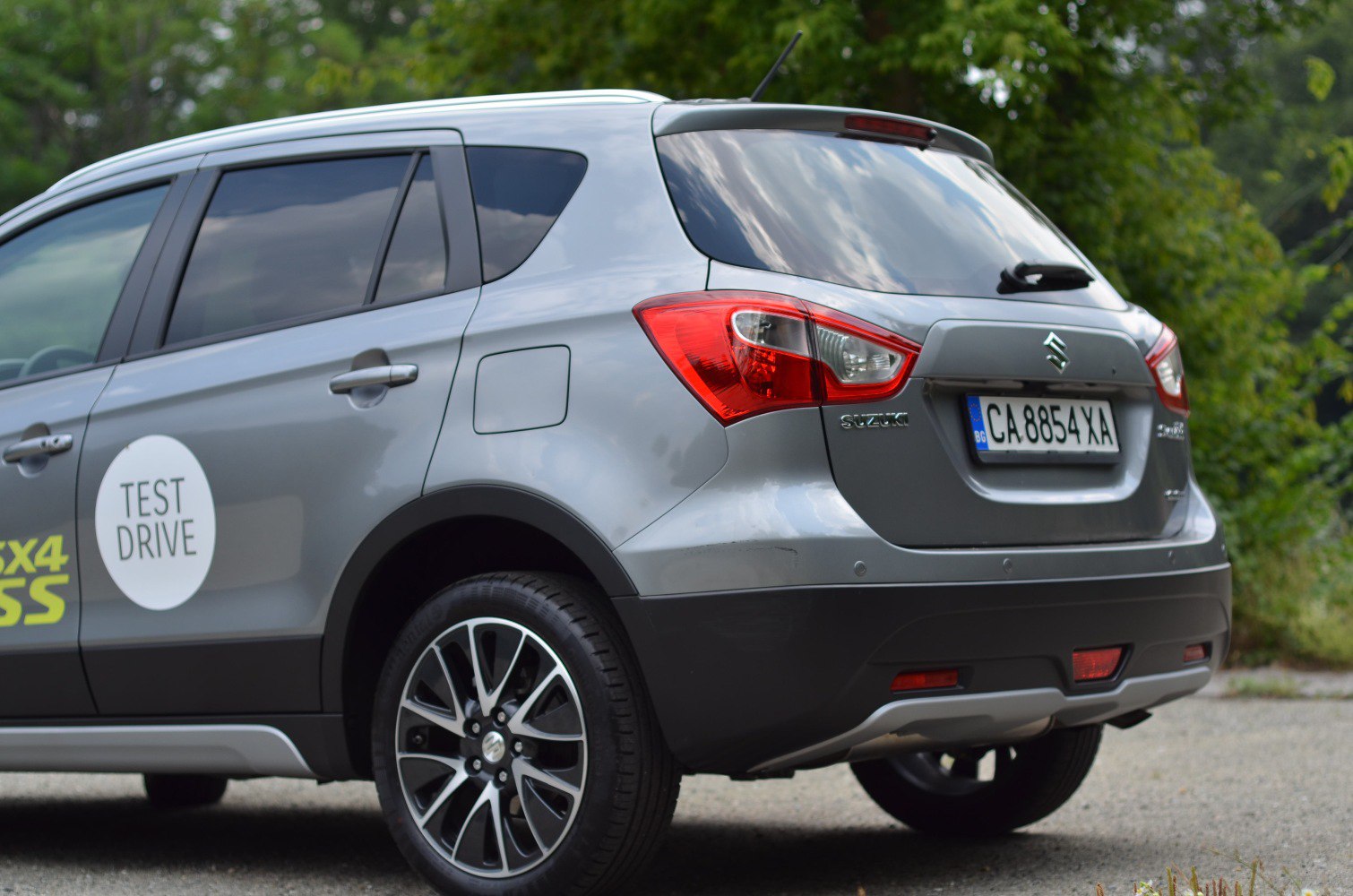 Rear side view with alloy wheels and tail lights on SUV
