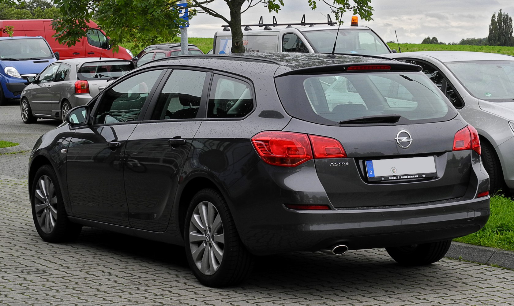 Rear view of an estate with distinctive tail lights
