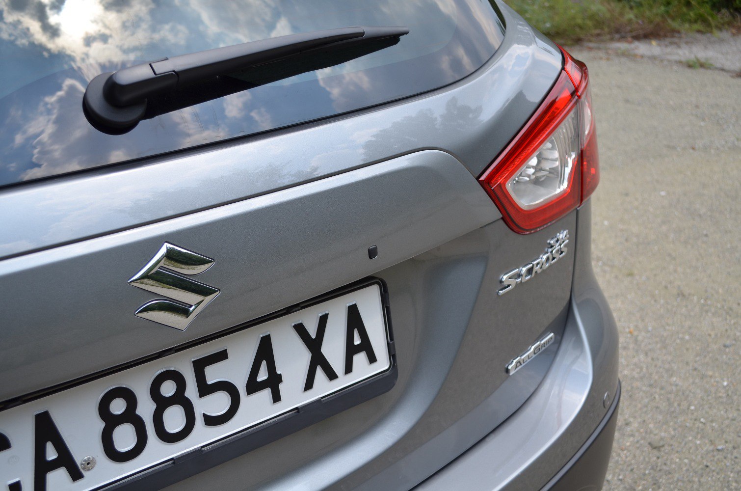 Rear end close-up with taillight and AllGrip badge