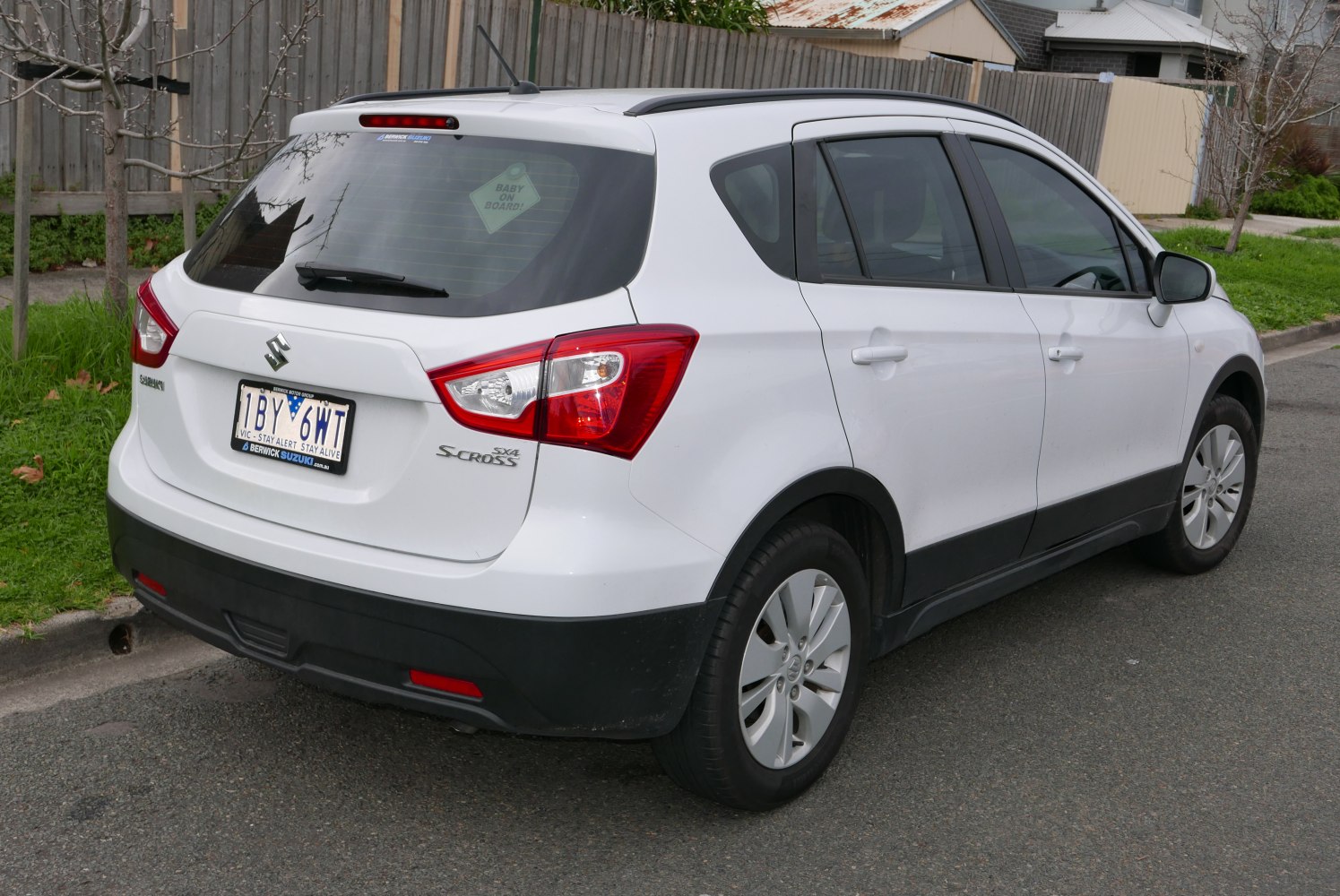 Rear and side exterior with taillights and black trims