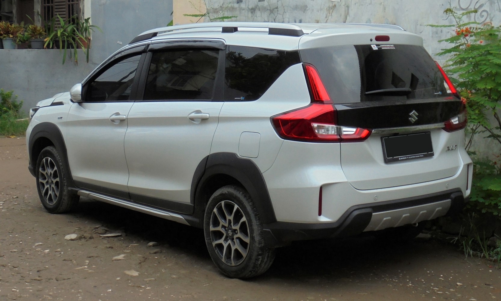 Rear side view of modern SUV with distinct taillights and rugged styling