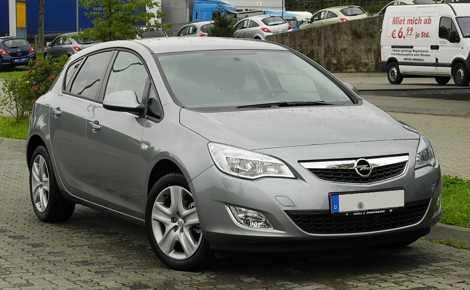 Front-side view of silver hatchback with modern headlights and alloy wheels