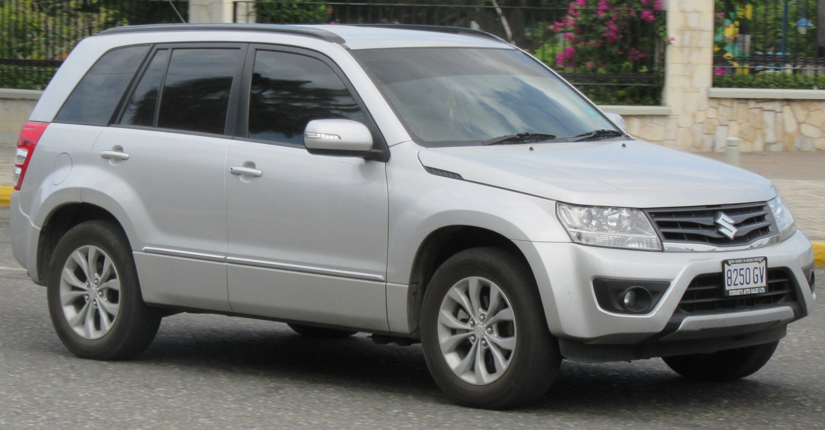 Silver SUV front and side profile with alloy wheels and roof rails