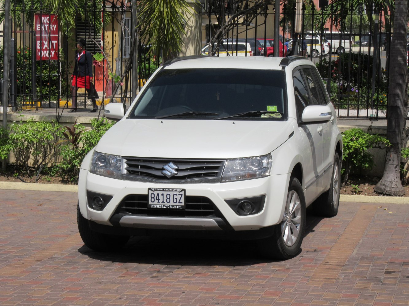 Front view of SUV with headlights, grille, bumper, and alloy wheels
