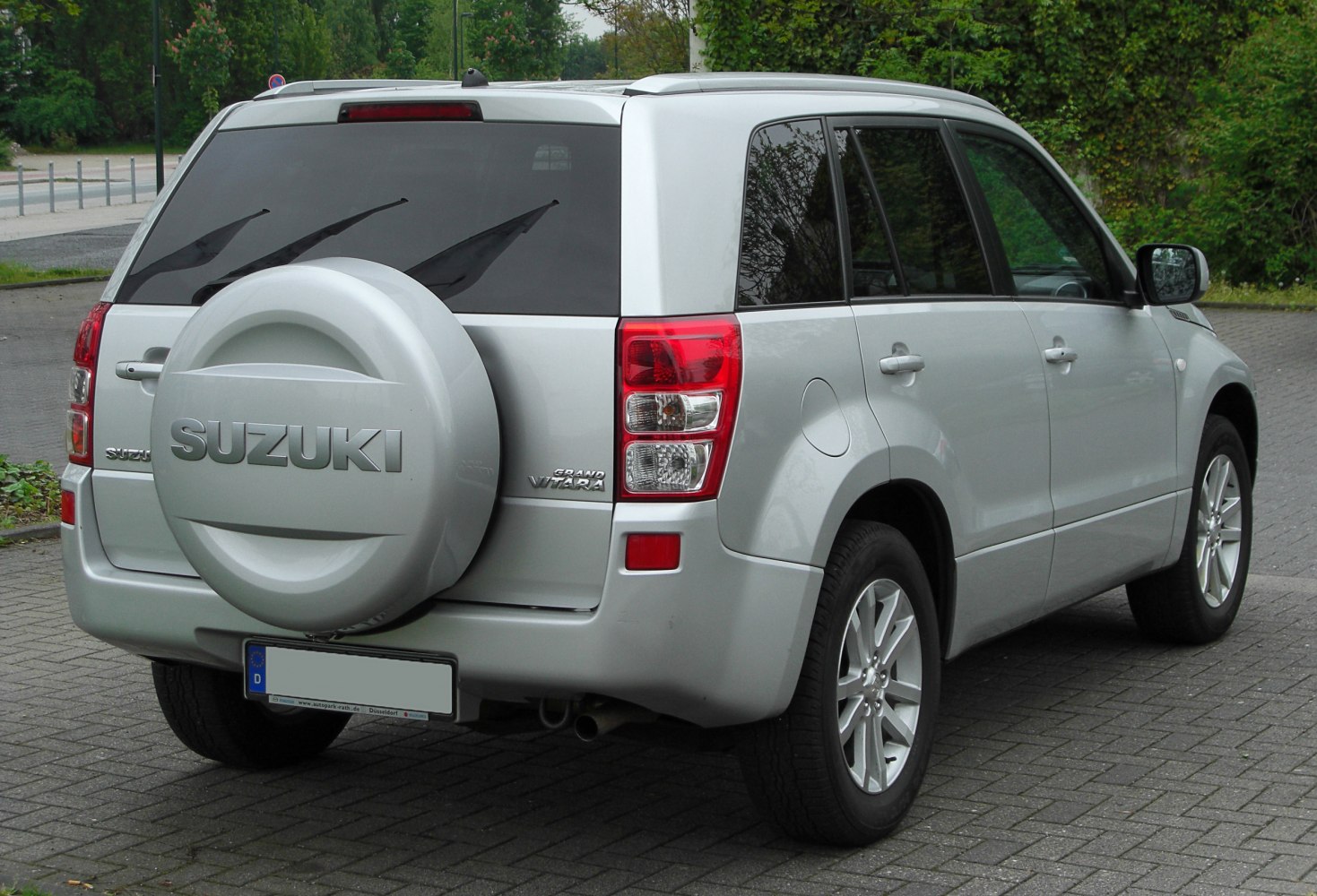 SUV rear with spare wheel cover and vertical taillights