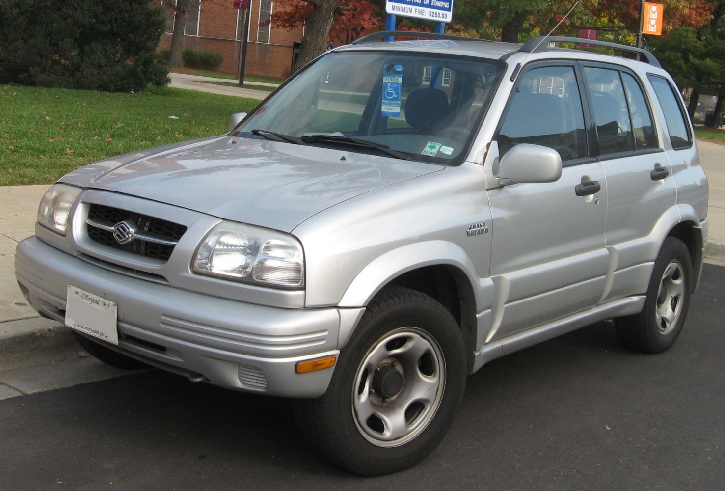 Front-side view with square headlights and alloy wheels