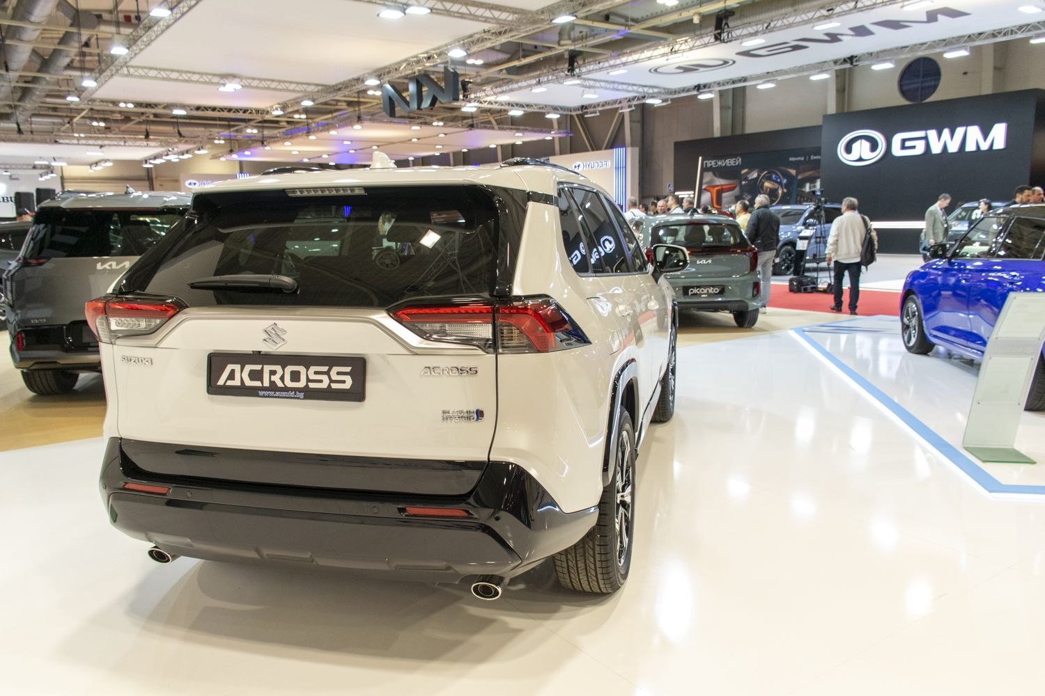Rear view of hybrid SUV with taillights and dual exhaust
