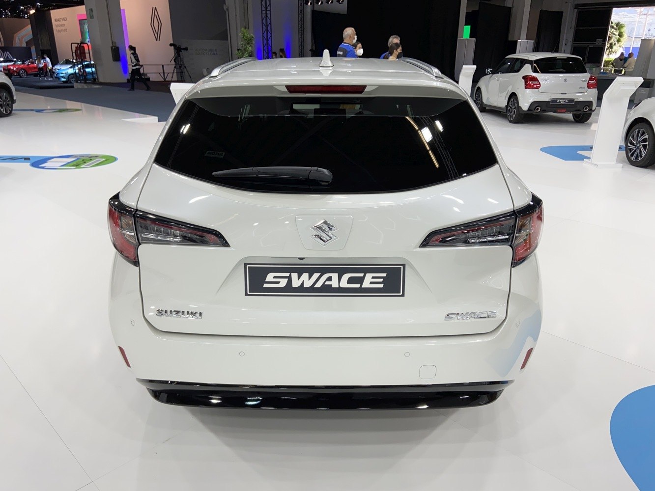 Rear view with distinctive tail lights and rear windshield