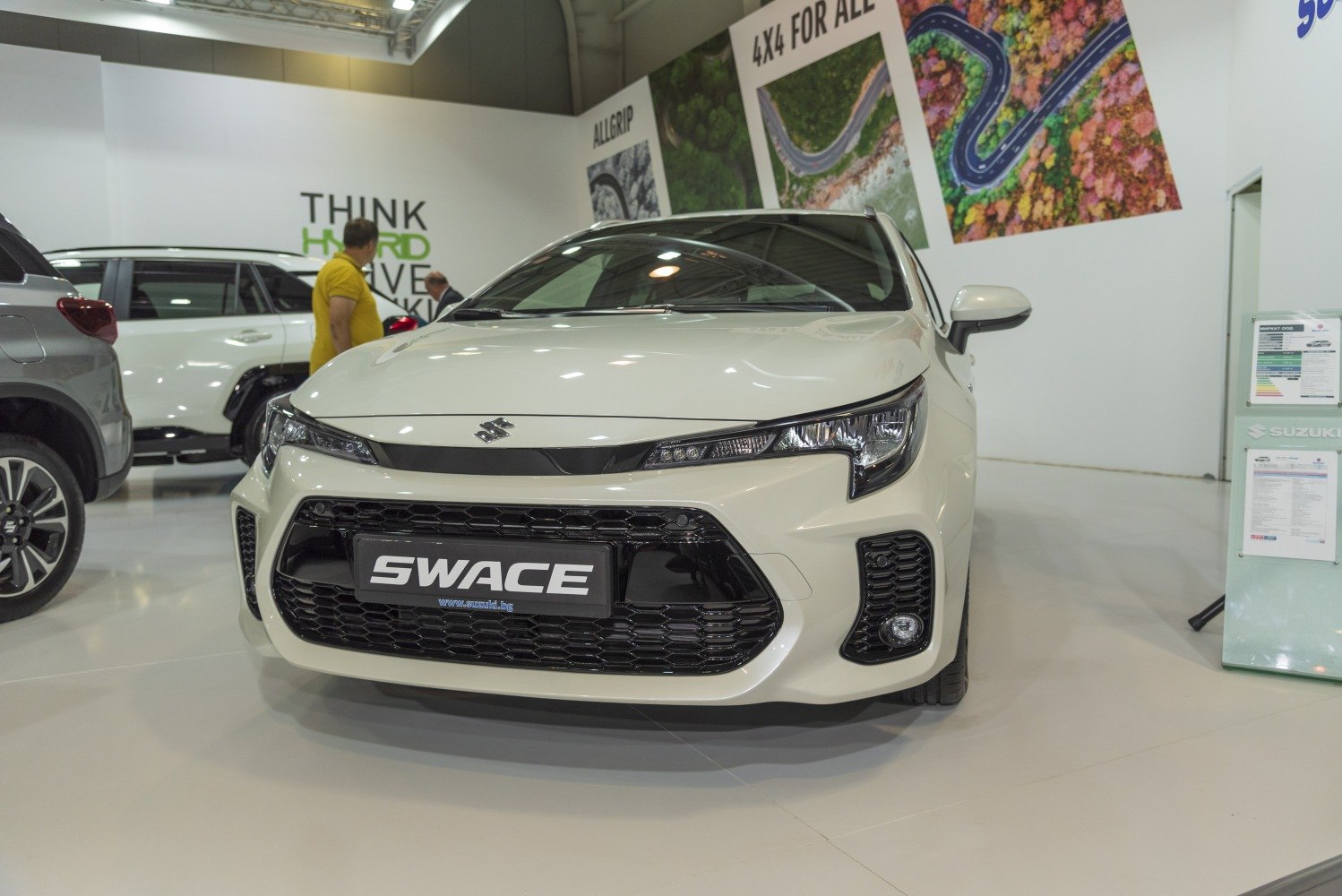 Sleek front grille and angular headlights with smooth hood lines