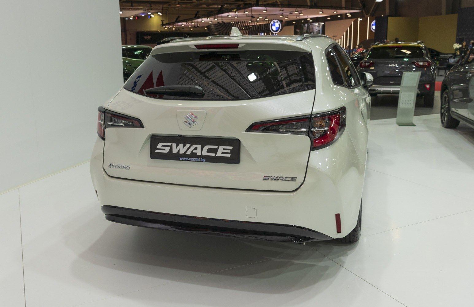 Rear view of hatchback with sleek tail lights and rear windshield wiper