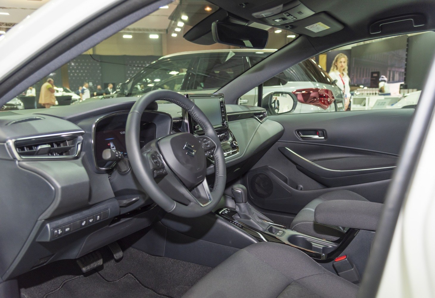 Modern car interior with touchscreen and multifunction steering wheel