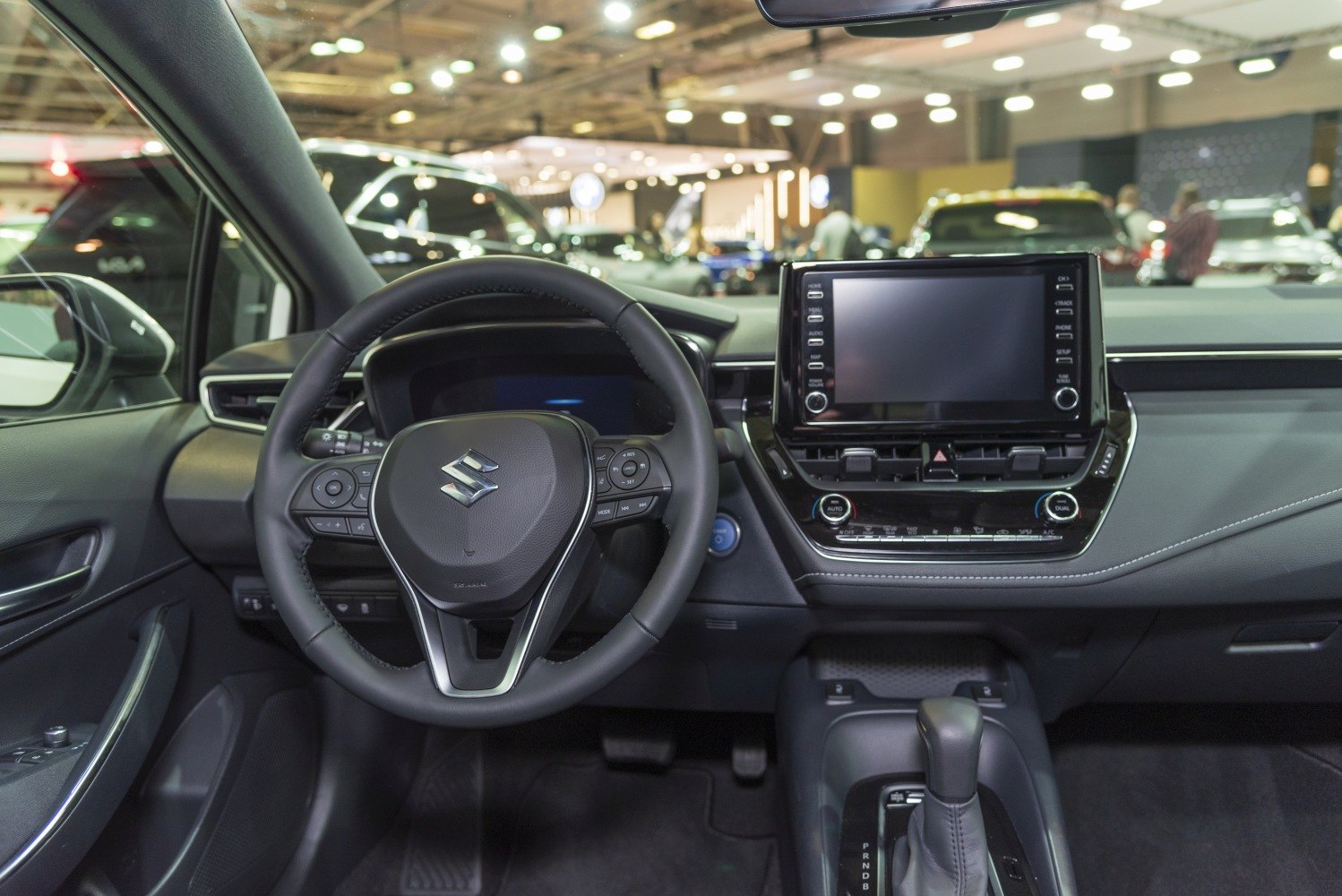Steering wheel and touchscreen dashboard interior features