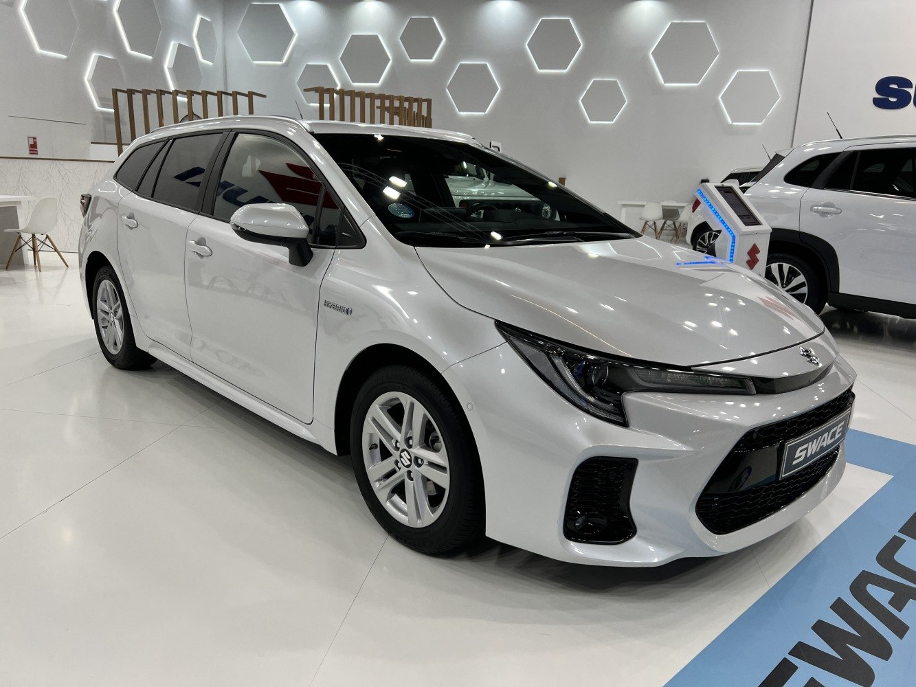 Hybrid wagon with sleek headlamps and alloy wheels