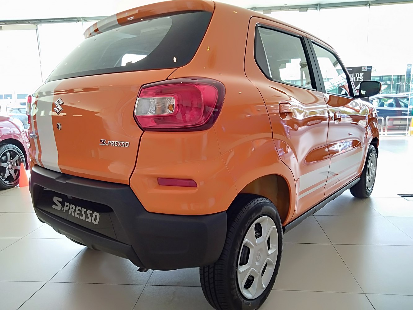 Compact car rear view with taillights and rear bumper