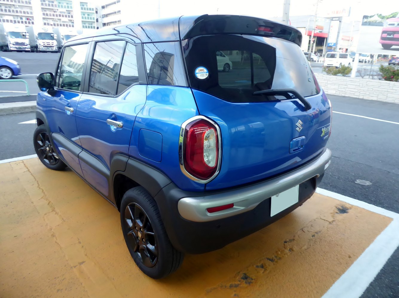 Compact SUV rear view with distinct taillights and black rims
