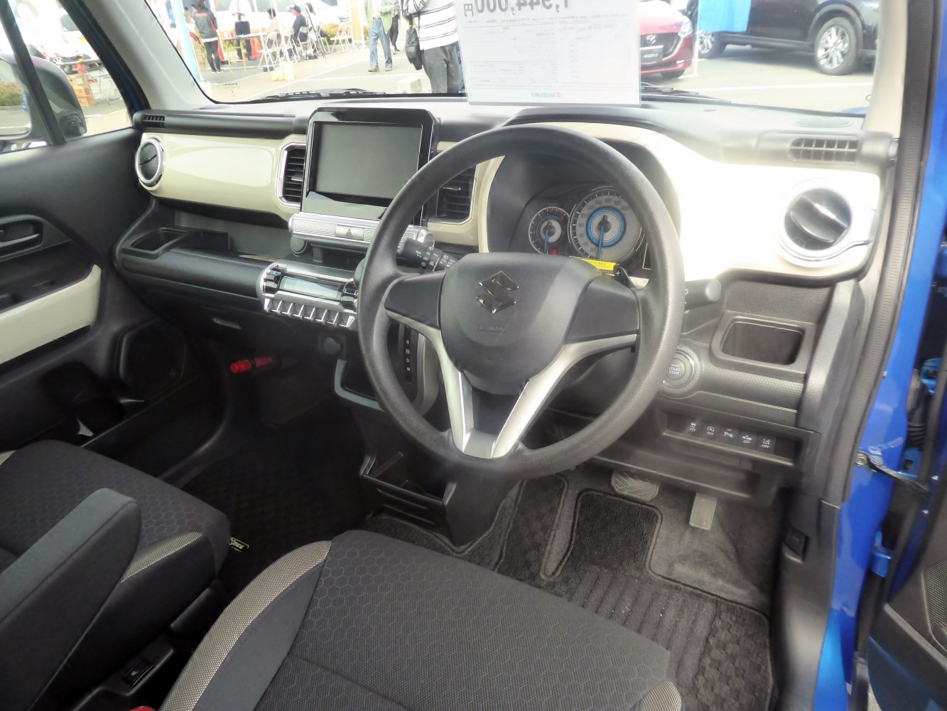 Interior dashboard with multifunction steering wheel and digital display