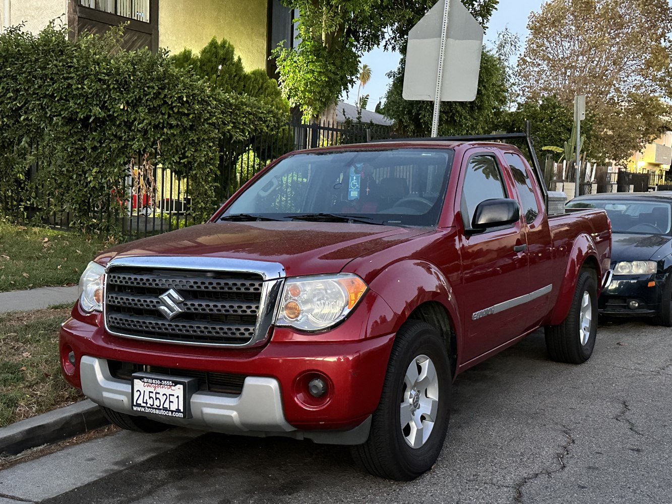 Extended cab pickup with front grille and headlights