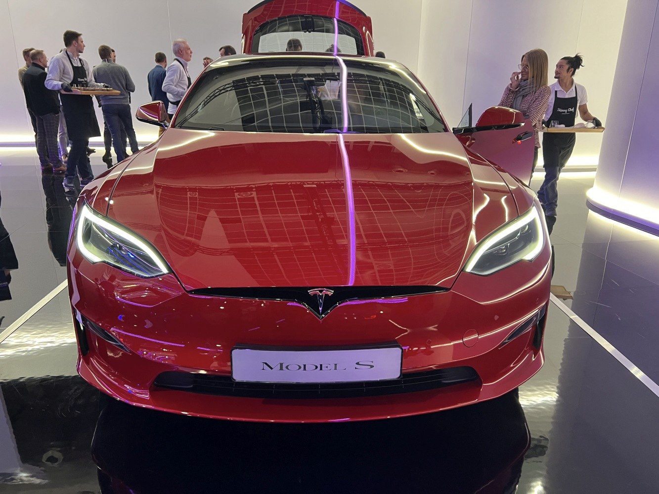 Front view of red Tesla Model S facelift 2021 with LED headlights
