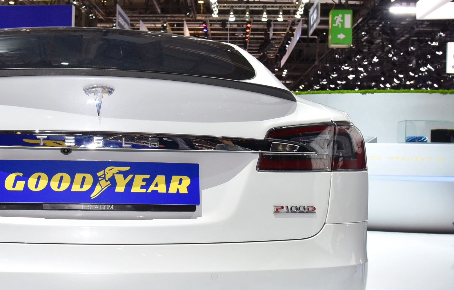 Rear view with Tesla emblem, P100D badge, and modern LED taillight.