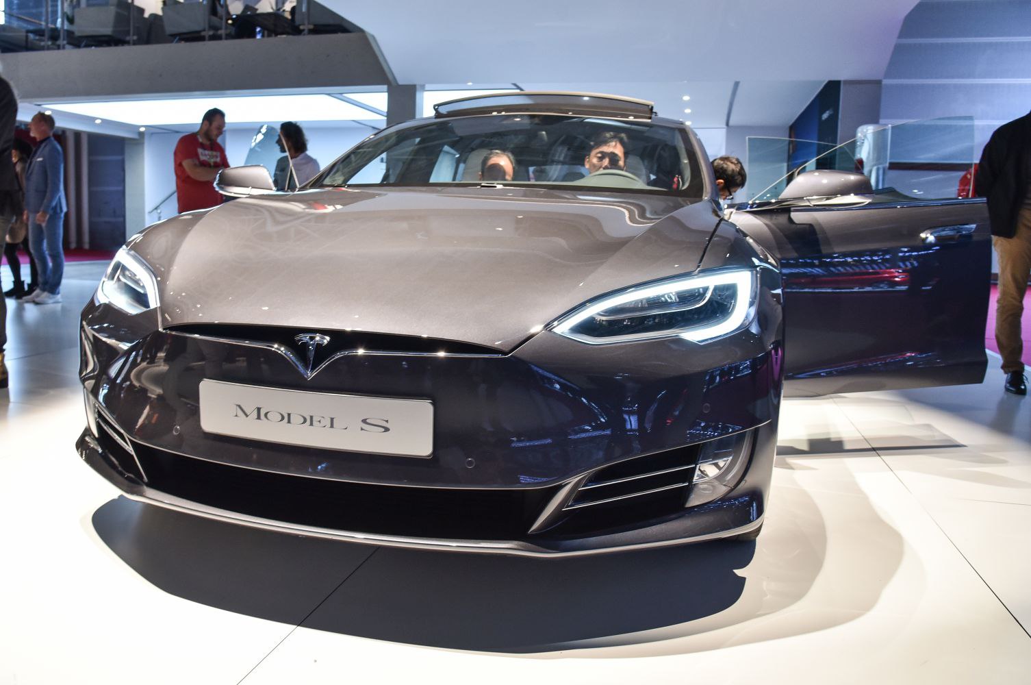 Front view of a car with LED headlights and aerodynamic design