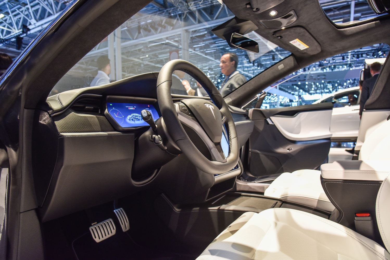 Digital dashboard and premium steering wheel inside a luxury car interior