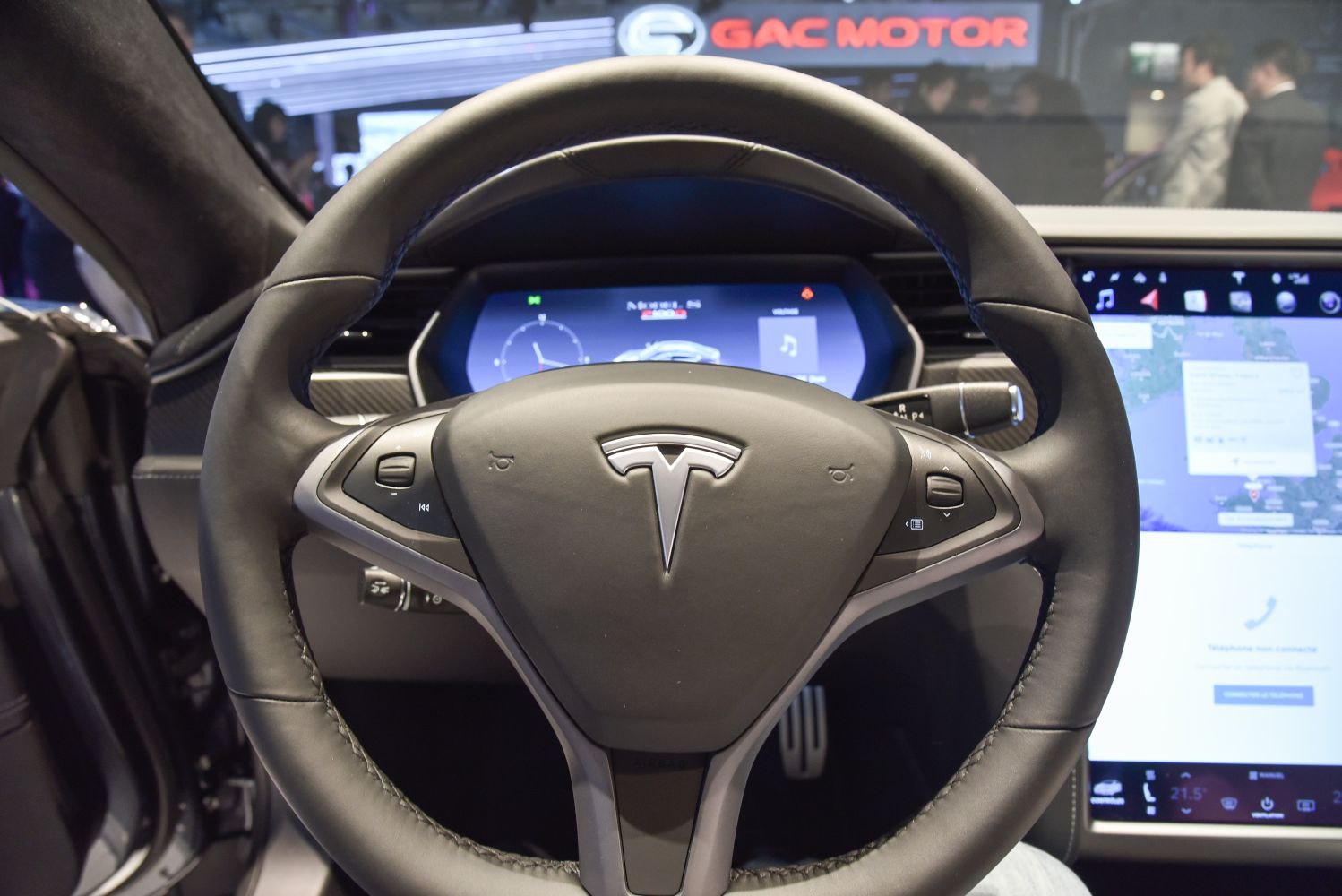 Tesla steering wheel and digital dashboard with touchscreen