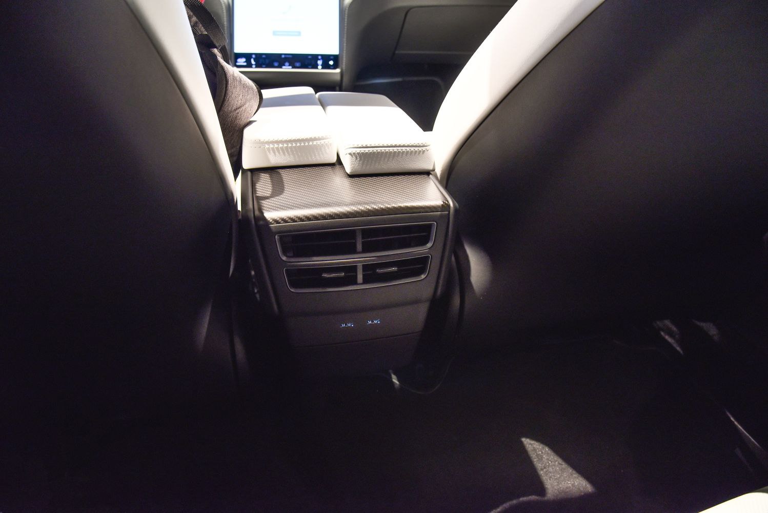 Rear air vents and dual USB ports in car interior