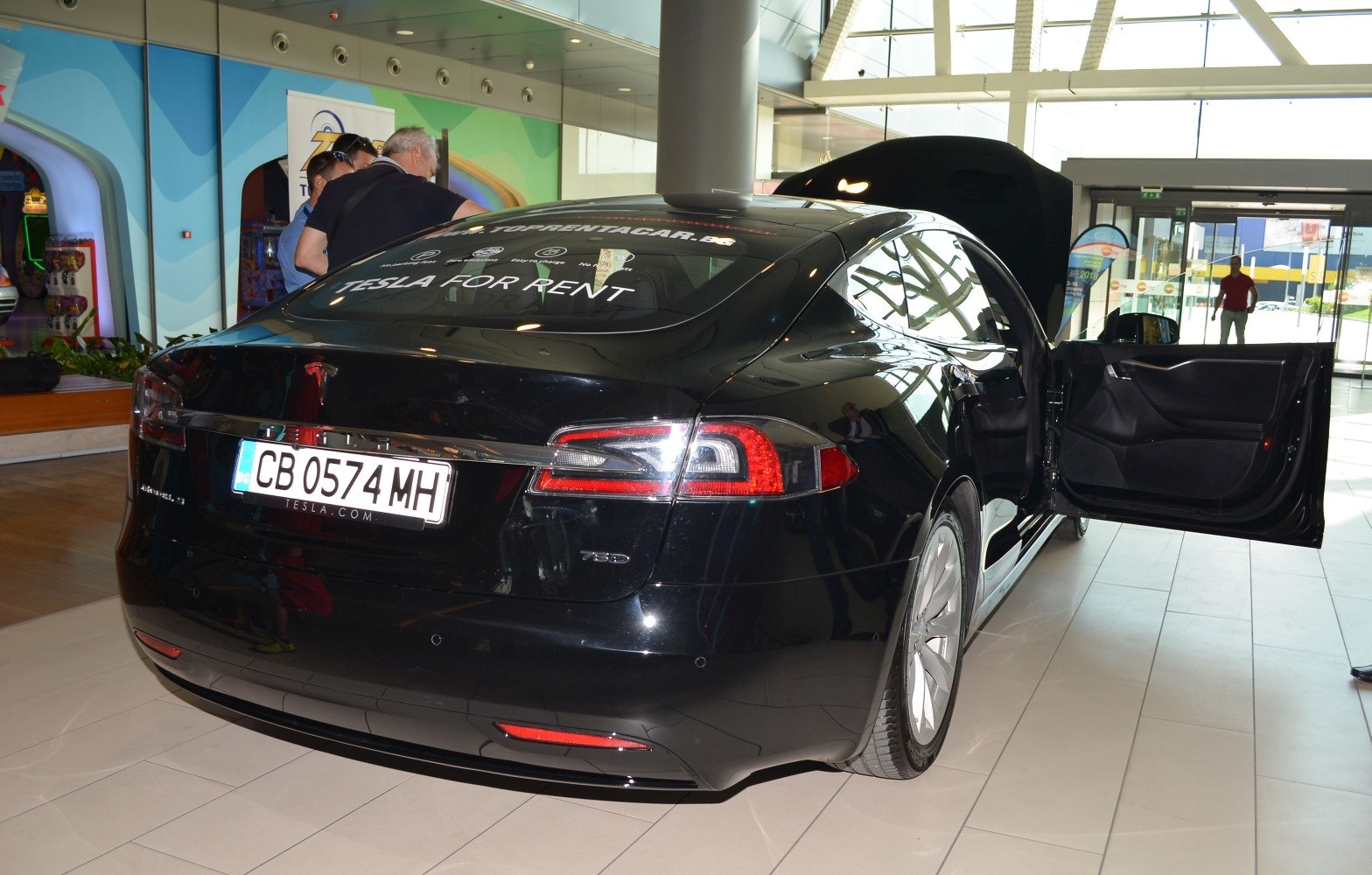 Rear view with LED tail lights and open rear door interior