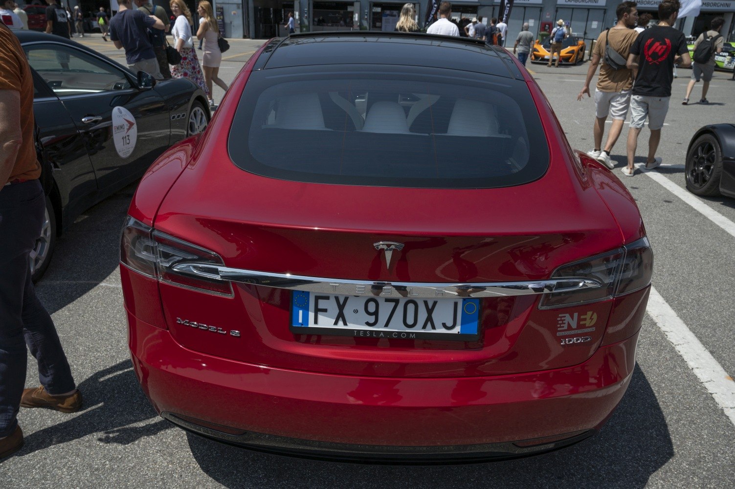 Red Tesla Model S facelift 2016 rear with distinct taillights