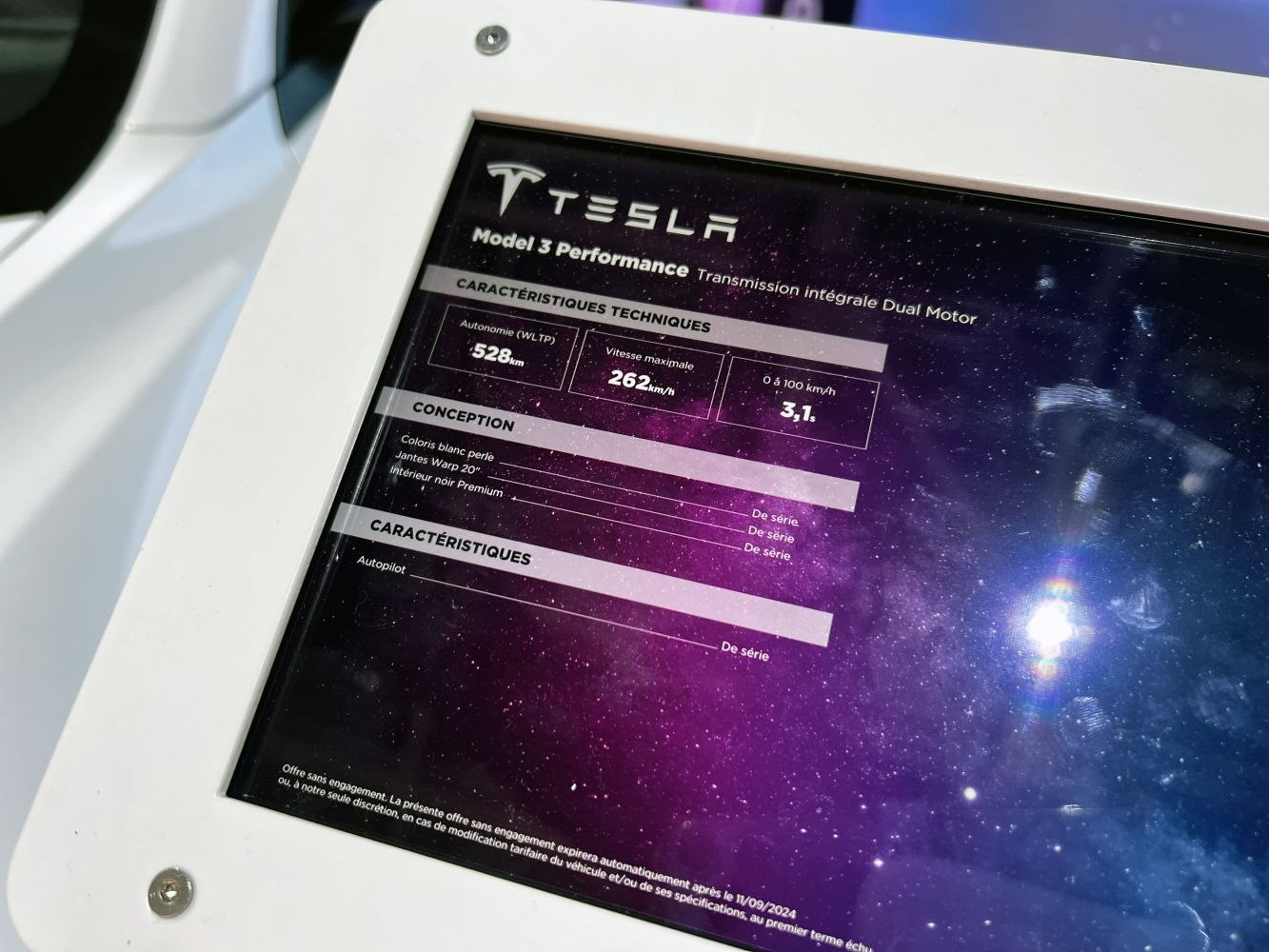 Tesla Model 3 Performance specs panel with range, speed, acceleration and features