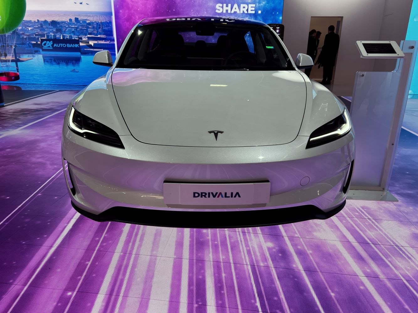Front view with sleek LED headlights and smooth hood design