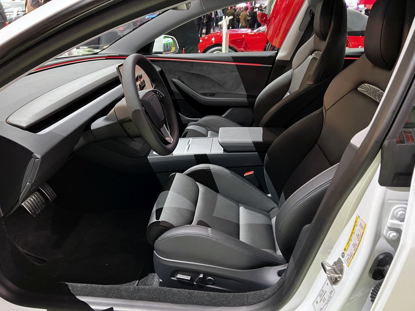 Sporty seats and minimalist dashboard interior design.